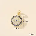 Ciondolo malocchio dorato di 1,5 cm di diametro con zirconi incastonati a mano - Malocchio (D1082)