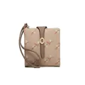 Detailed view of women's short bi-fold wallet with leaf print and wrist strap - Apricot
