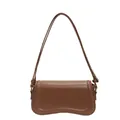 Modern Korean style brown underarm baguette bag with unique curved bottom design - Brown