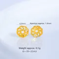 Gros plan de calottes de perles fleurs évidées dorées pour accessoires bijoux DIY - Calotte Fleur en Spirale 6.7mm (G-39-20) / 1 Pièce / Or