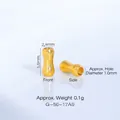 Vue macro d'une perle d'espacement dorée pour bijoux DIY avec dimensions. - Perle d'Espacement en Forme d'Os (G-56-17) / 1 Pièce / Or