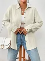 Detailed texture of women's cream long sleeve dropped shoulder shirt with buttons - Apricot