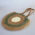 Fashionable round multi-color straw woven shoulder bag with stylish faux leather straps - Green