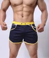High-quality men's navy blue athletic shorts with yellow contrast trim and white drawcord - M / Sapphire Blue