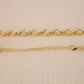 Close-up of a gold-plated heavy metal chain with lobster clasp detail for jewelry - Gold Necklace Style 6