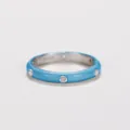 Macro view showing the blue enamel finish and inlaid zircons on this minimalist ring - Sky Blue