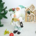 Detail of the Christmas Santa Claus figure featuring an aqua suit and a lantern - Green Santa