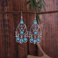 Bohemian style ethnic silver earrings featuring turquoise beads and chandelier tassel - Antique Silver