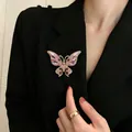 Stunning pink crystal butterfly brooch accessory for women wearing black blazers. - Colorful Rhinestone Butterfly Style (E4585)