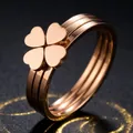 Elegant rose gold stainless steel ring featuring a four-leaf clover heart design. - US 5 / Four-Leaf Clover Style / Rose Gold