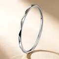 Modern minimalist stainless steel faceted geometric ring in polished silver finish - US 5 / Steel