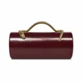 Close-up of the glossy burgundy PU leather texture and golden snake-shaped handle - Wine Red (Gilded Snake)