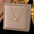 Elegant gold plated titanium steel necklace featuring a heart shaped zircon pendant - Solitaire White Gem Heart Style (H1140)