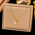 Elegant gold plated titanium steel necklace with white pearl and gold shell pendant - Artificial Pearl & Shell Style (H1087)