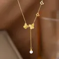 Elegant gold butterfly necklace made of titanium steel with a delicate white pearl drop - Butterfly Artificial Pearl Tassel (H1098)