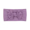 Premium soft and stretchy lilac nylon baby headband featuring a decorative bow. - Lavender
