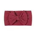 Soft burgundy nylon baby headband with a large decorative bow for infants and toddlers - Dark Red