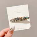 Korean style colorful marble pattern resin duckbill hair clip on a white display card - Blue Floral Pattern