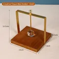 Square golden metal napkin holder with solid wooden base and crystal weight detail - Wood Base Square Style / Gold