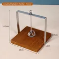 Elegant modern square napkin holder featuring a silver metal frame and a rich wooden base - Wood Base Square Style / Silver