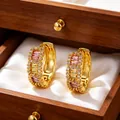 Exquisite gold wave hoop earrings featuring radiant pink and yellow crystal stones - Gold Wave Border Multi-color Rhinestone Stud Earrings (E6969G)