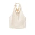 Detail view of an elegant champagne satin halter neck top with a draped neckline - XS / Tops / Milky White