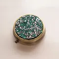 Portable round metal pill box encrusted with green rhinestones and internal mirror - Bronze - Silver Teal Green