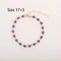 Vue détaillée d'un bracelet œil protecteur doré ajustable avec perles mauves, taille 17+5 cm - Bracelet Violet Doré
