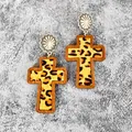 Close-up of leopard print cross earrings with wooden frame and metal studs - Light Leopard(2)