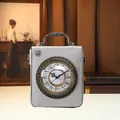 Vintage clock-shaped crossbody handbag with real working dial and metal handle. - Gray