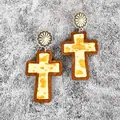 Detailed macro view of Western style wooden cross earrings with cow print leather inlay - Brown White Cow(5)