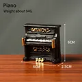 Retro miniature black resin piano figurine for home decor with gold relief detail - Piano