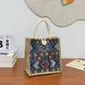 Ethnic style woven tote bag featuring colorful tribal patterns and rope handles - Blue