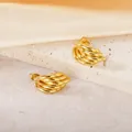 Close-up detail of polished gold geometric layered titanium steel stud earrings - Multi-Layer Hoop Style (PJER309) / 20mm / Gold