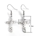 Vue détaillée de boucles d'oreilles croix en acier inoxydable avec Amazing Grace - Lettre croix