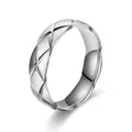Macro view of quilted diamond pattern on silver stainless steel band ring - Size 5 / Steel (6mm)