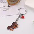 Cute waving dachshund dog keychain with red heart charm, creative zinc alloy bag pendant - Dachshund (Brown) / 10cm