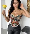 Detailed view of a vintage floral print corset bustier top with delicate white lace trim - S / Black Orange Floral