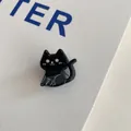 Close-up view of a cute Halloween black cat acrylic hair claw clip with glitter detail - Little Black Cat Clip