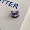 Macro view of purple Halloween monster cat acrylic mini hair claw clip for girls - Skull Cat Clip
