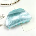 Elegant medium acrylic hair claw clip with blue and white water ripple marble pattern - Stone Green