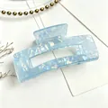 Elegant light blue acrylic marbled hair claw clip for chic hair styling and updos - Blue 10.5cm