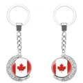 Detailweergave van roterende halve maan sleutelhanger met Canadese vlag design - Vlag van Canada (62438501)