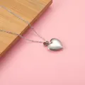 Exquisite stainless steel heart locket necklace with a brown crystal birthstone charm. - Light Crystal Yellow