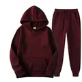 Close-up detail of the maroon solid color hooded sweatshirt and matching pants sports set - S / Top And Bottom / Burgundy