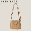 Woven paper rope crossbody bag with colorful beaded flap and tan strap - Camel