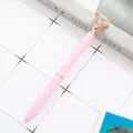 Elegant pink metal ballpoint pen featuring a large sparkling crystal diamond on top - Matte Pink with Rose Gold Parts / 1.0mm Bullet Tip