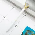 White metal ballpoint pen with elegant large diamond topper and gold accents. - White with Gold Parts / 1.0mm Bullet Tip