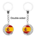 Llavero giratorio de doble cara de metal en forma de luna con la bandera de España - Bandera de España (62438532)