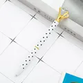 Elegant white polka dot metal ballpoint pen with a large crystal diamond top - White with Black Polka Dots / 1.0mm Bullet Tip